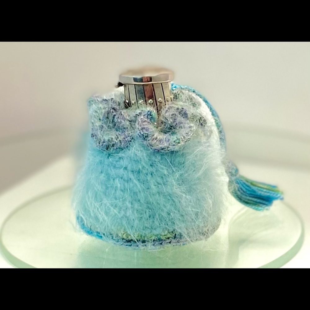 Hand-made angora, mohair and silk change purse. Vintage accordion clasp.